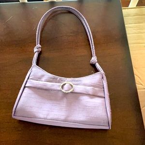 Purple toy purse